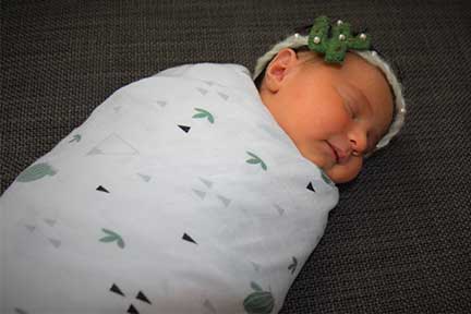 swaddled baby sleeping